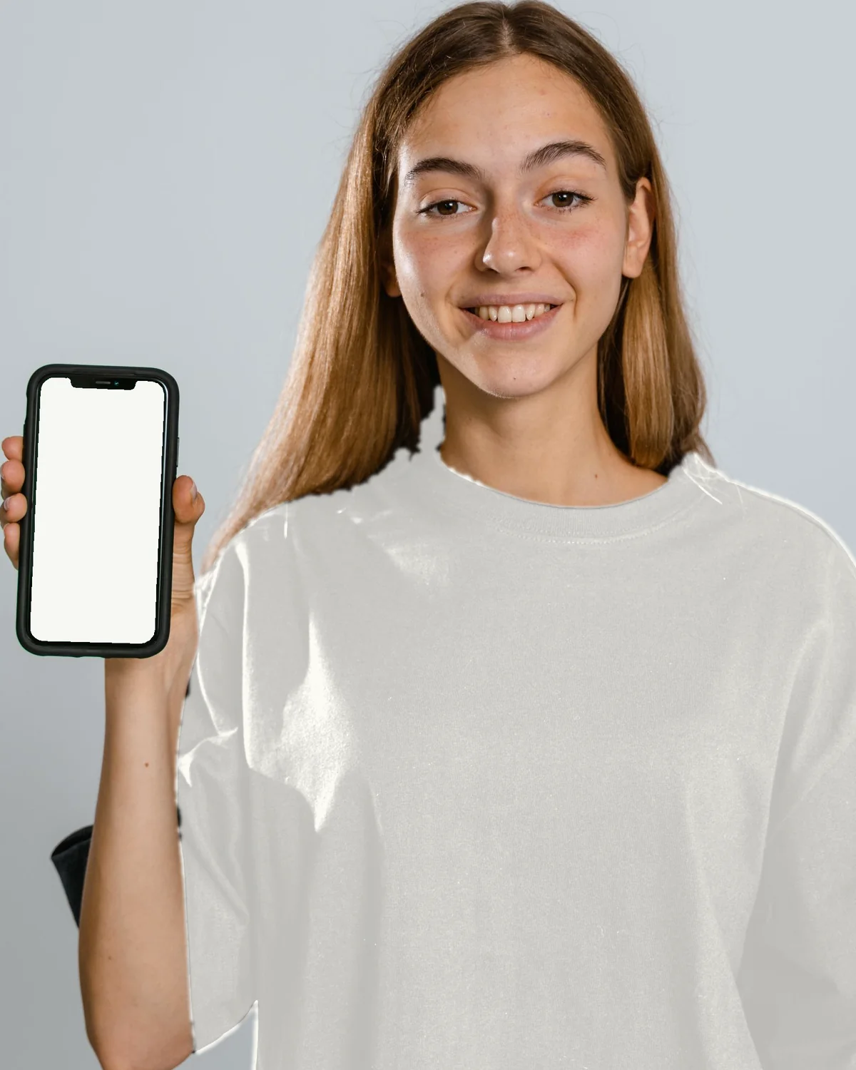 The same woman, a moment later, glancing at her phone with a soft smile